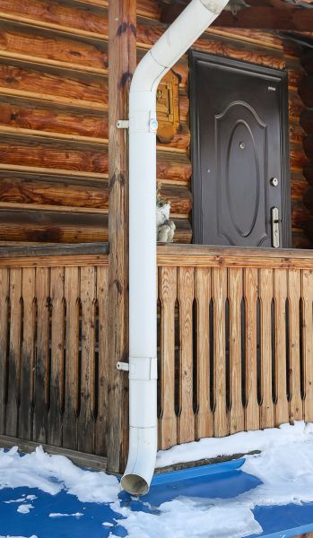 Porch Downspout Installation in Northville