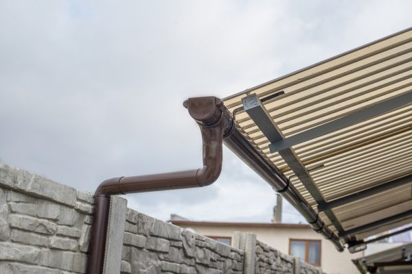 Plastic Downspout Installation in Northville